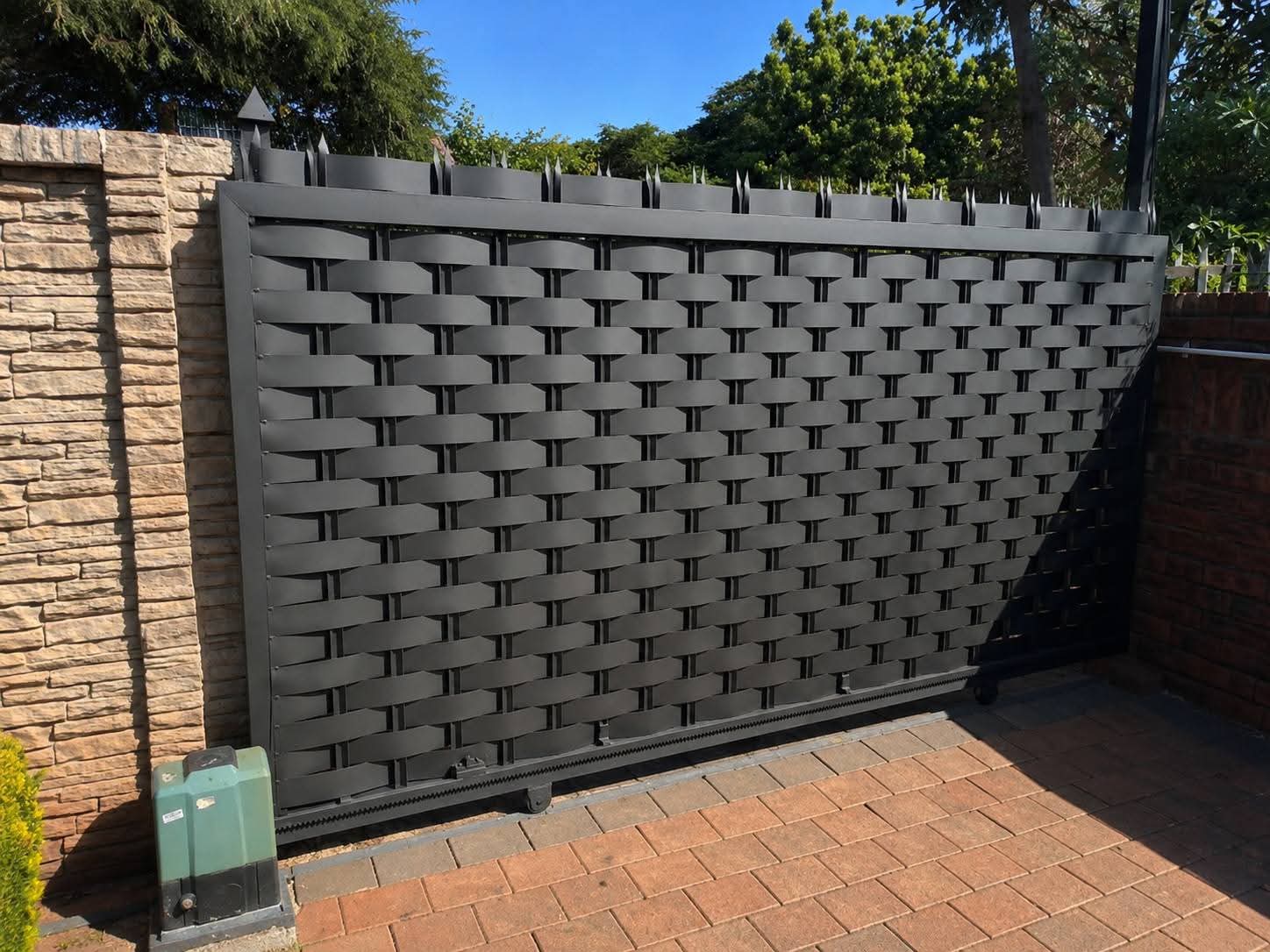 Charcoal woven sliding driveway gate